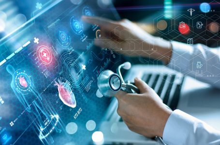 Cardiologist diagnosis patient heart testing result and human anatomy with database electronic medical record on network. AI, Innovation and technology, Digital healthcare on futuristic hologram